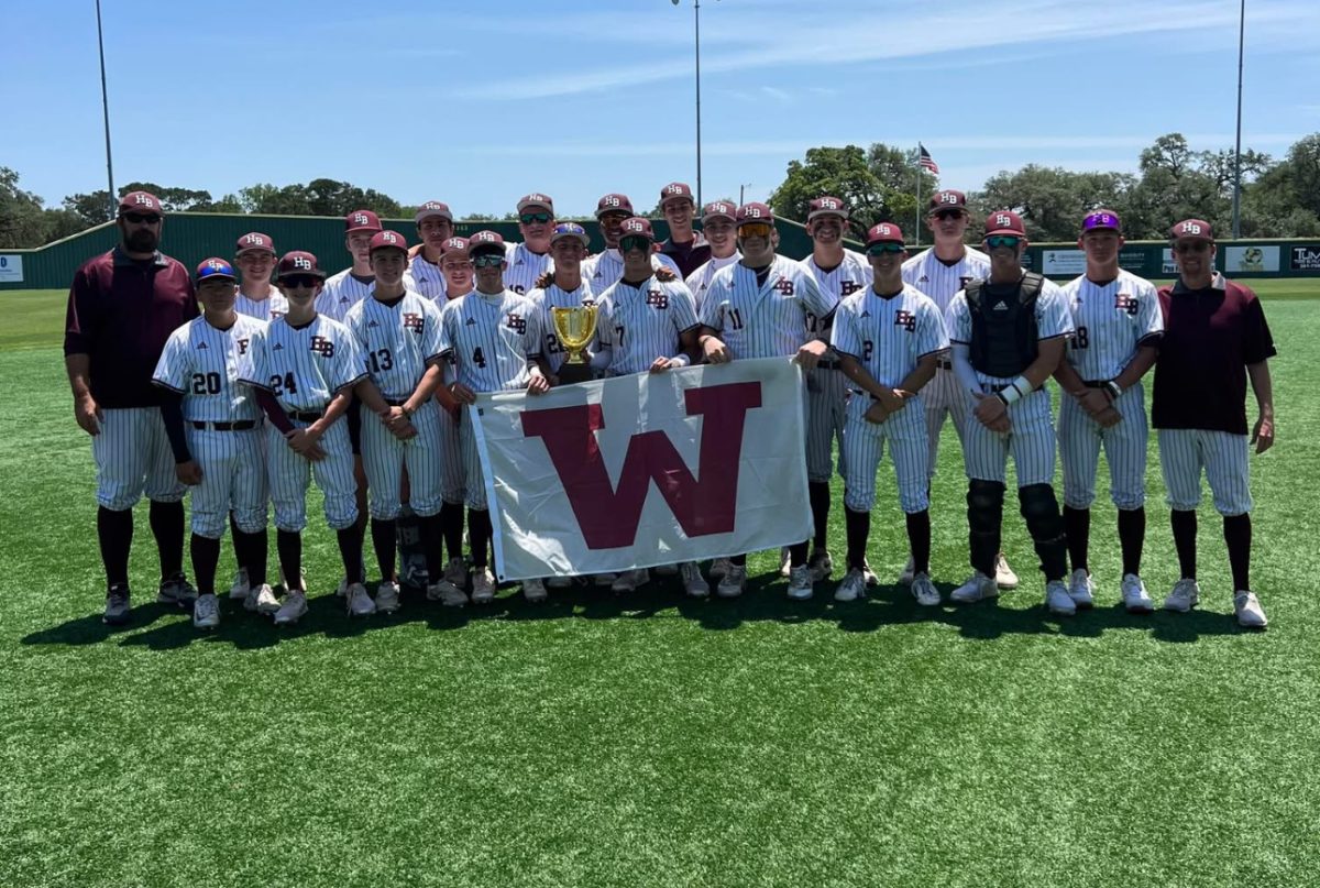 
Brahma baseball team pose after playoff win. 
